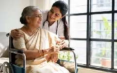 Caregiver supporting a patient at home
