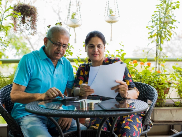 Caregiver and client sharing a warm, trusting moment at home